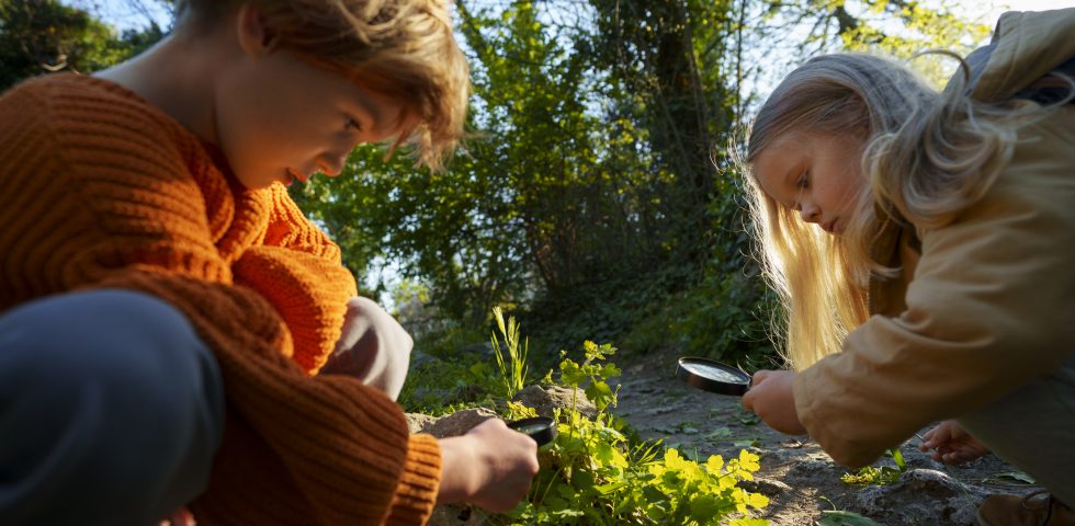 side-view-kids-exploring-nature-together